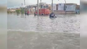 باران شدید در بندر گناوه موجب آب‌گرفتگیِ خیابان‌ها شد