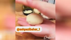 مواد لازم : #گوشت چرخ کرده پنیر ورقه ای خمیر پیتزا کره آب شده سیر رنده شد